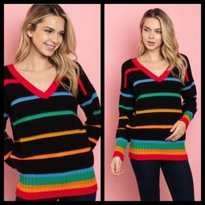 Black sweater with multi color stripes